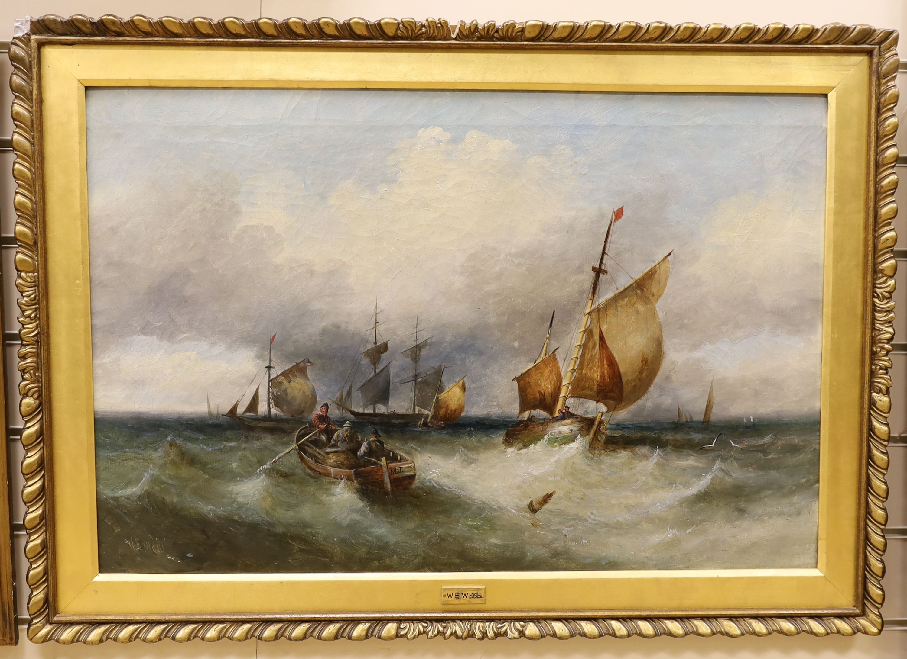 Circle of William Edward Webb (1862-1903), oil on canvas, Shipping off the coast, signed, 50 x 75cm